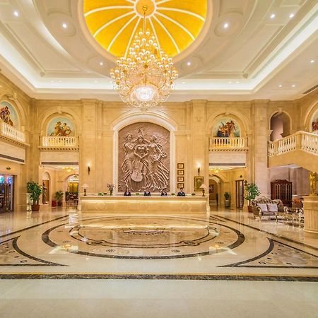 Vienna International Hotel Yantai Changjiang Road Xingyi Square Branch Экстерьер фото