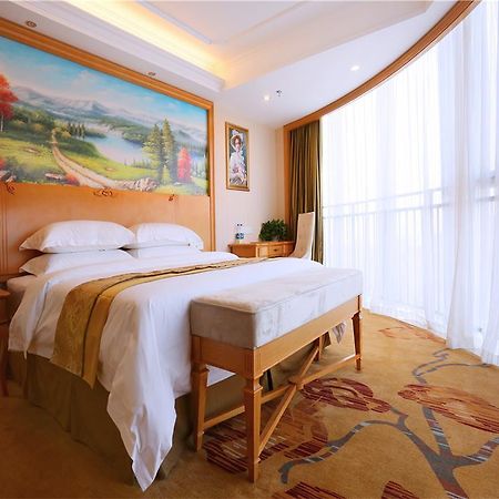 Vienna International Hotel Yantai Changjiang Road Xingyi Square Branch Экстерьер фото