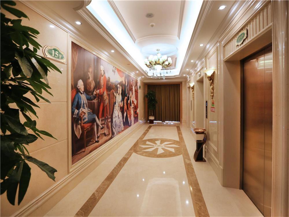 Vienna International Hotel Yantai Changjiang Road Xingyi Square Branch Экстерьер фото
