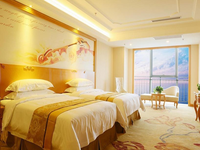 Vienna International Hotel Yantai Changjiang Road Xingyi Square Branch Экстерьер фото