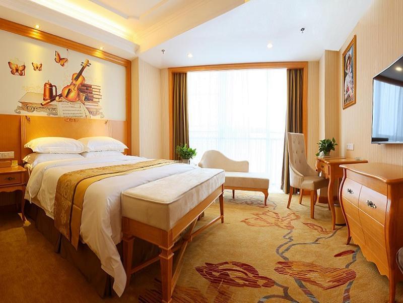 Vienna International Hotel Yantai Changjiang Road Xingyi Square Branch Экстерьер фото