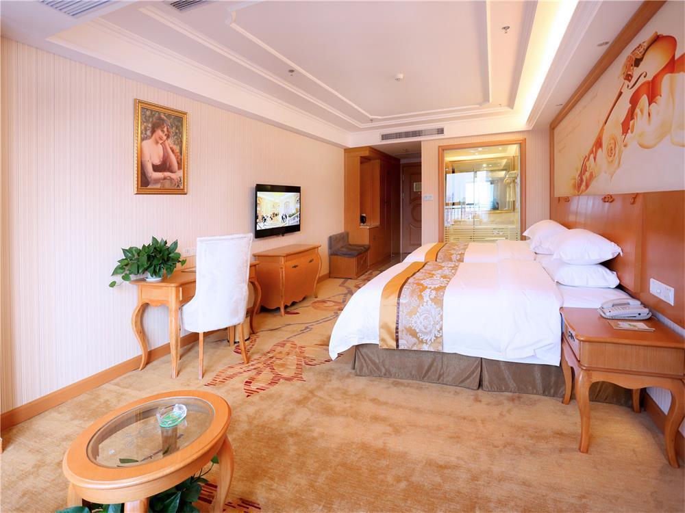 Vienna International Hotel Yantai Changjiang Road Xingyi Square Branch Экстерьер фото