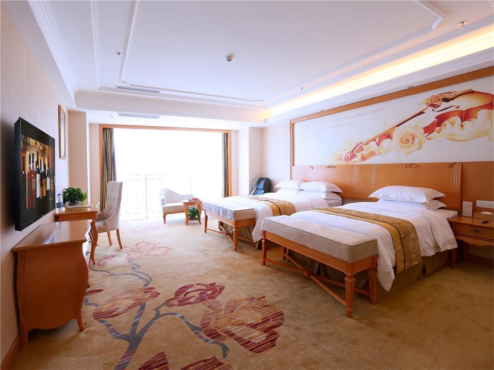 Vienna International Hotel Yantai Changjiang Road Xingyi Square Branch Экстерьер фото