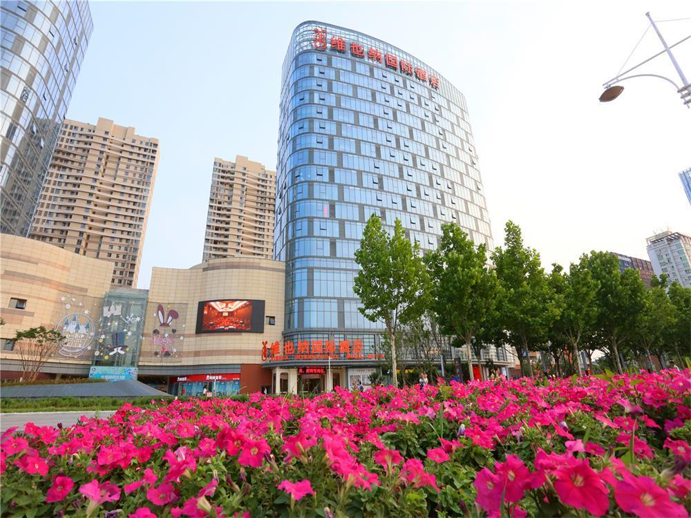 Vienna International Hotel Yantai Changjiang Road Xingyi Square Branch Экстерьер фото