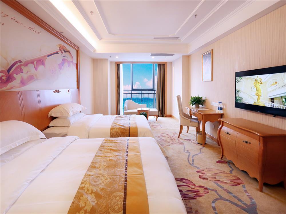 Vienna International Hotel Yantai Changjiang Road Xingyi Square Branch Экстерьер фото