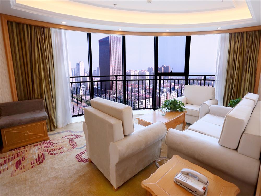 Vienna International Hotel Yantai Changjiang Road Xingyi Square Branch Экстерьер фото